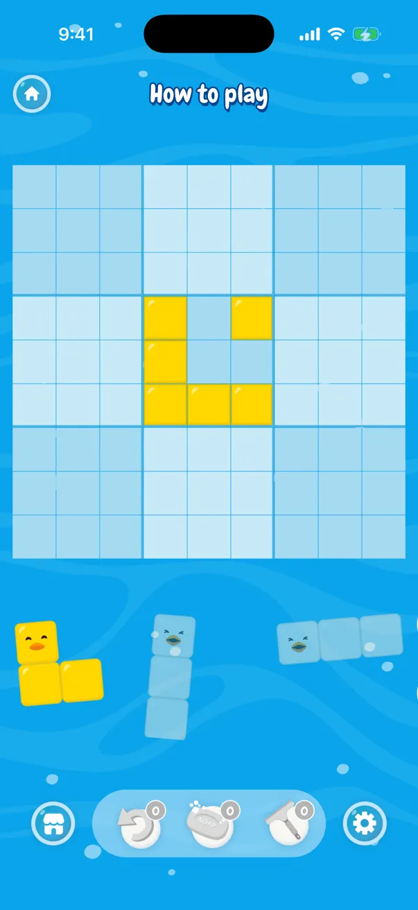 The How to play board with the tray of bricks below it